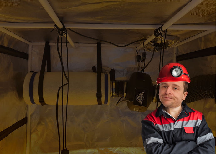 Where should I install a carbon filter in my grow tent?